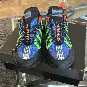Size 101/2 brand new never worn,rare Versace shoes,got them to big